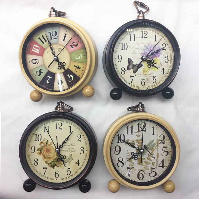 1pc CLOCK - METAL ALARM CLOCK 12CM 4 ASSORTED DESIGNS